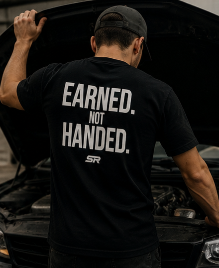 Earned Tee. NOT HANDED.